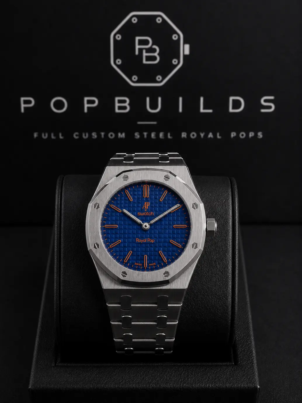 Orenji Hachi full mod watch with a blue aftermarket dial and orange indices in a stainless-steel case