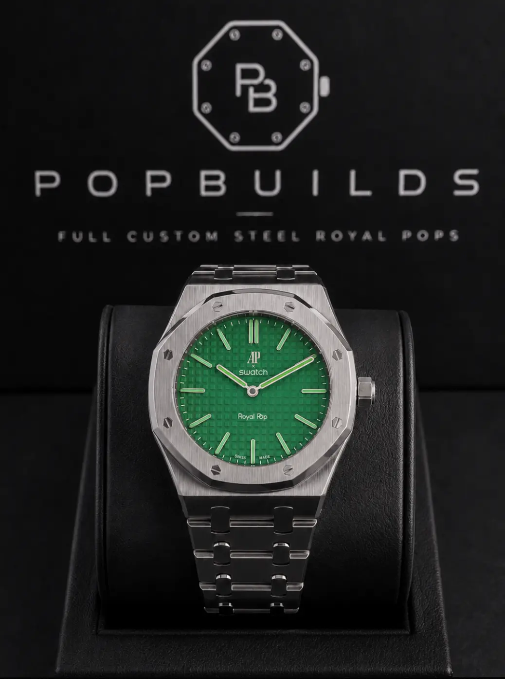 Green Eight full mod watch with a vivid green aftermarket dial in a stainless-steel octagonal case