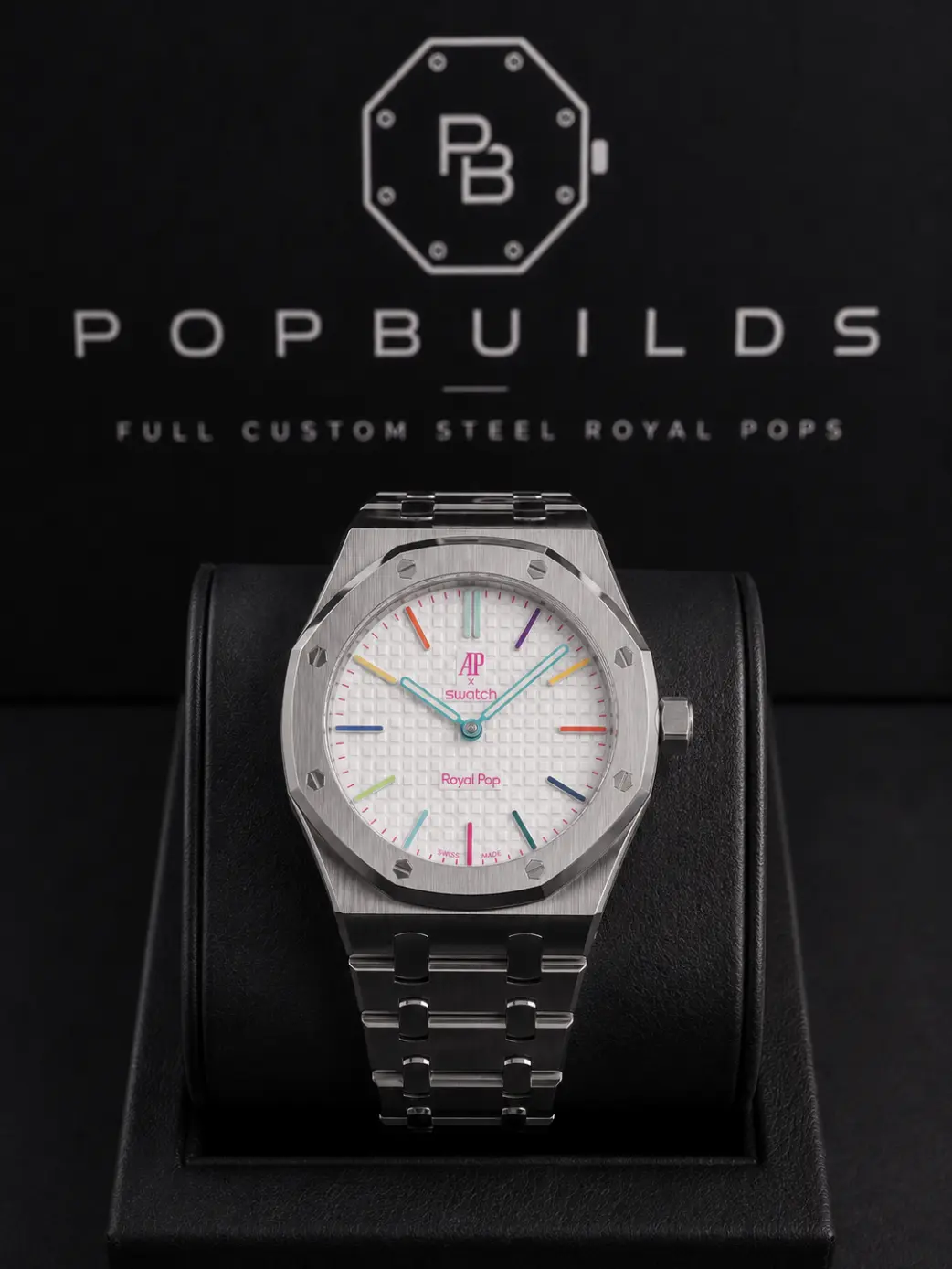 Huit Blanc full mod watch with a white aftermarket dial and multicolour indices in a stainless-steel case